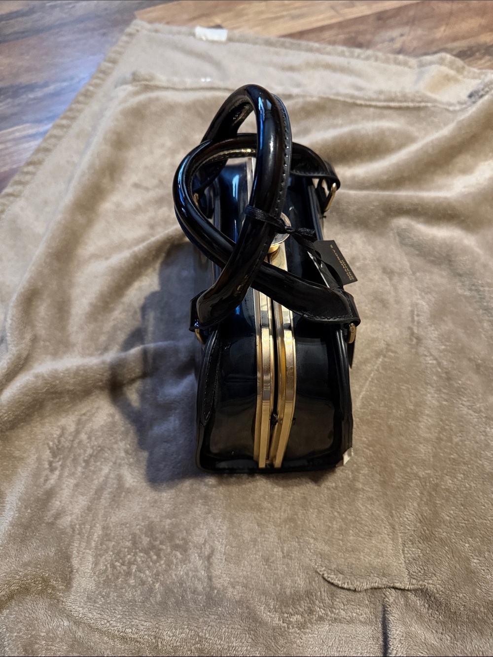 Black Patent Leather Top-Handle Bag with Gold Trim